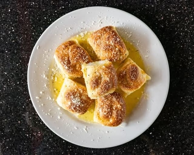 Six Garlic Rolls W/Cheese.
